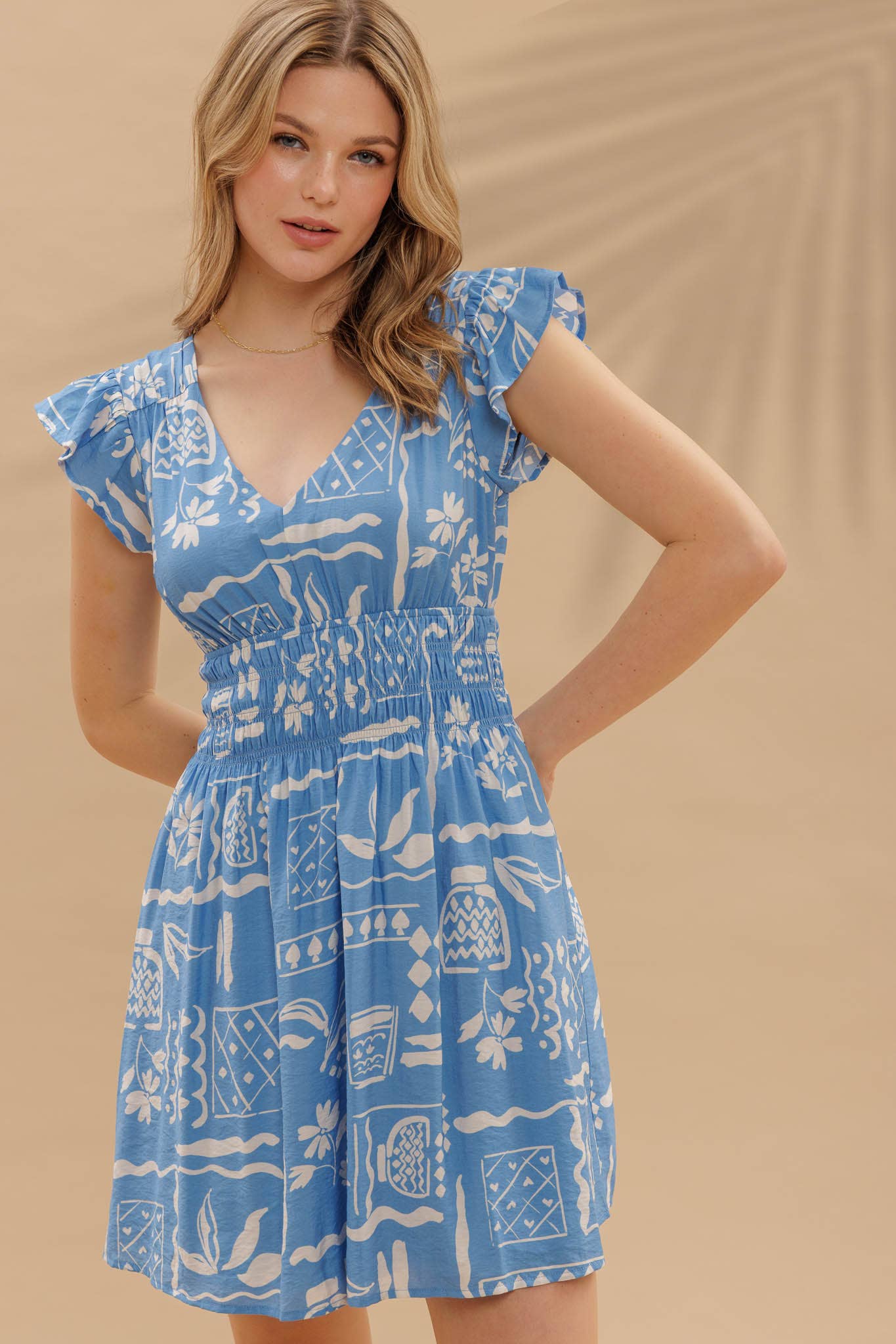 Blu Pepper Print V Neck Ruffle Mini Dress