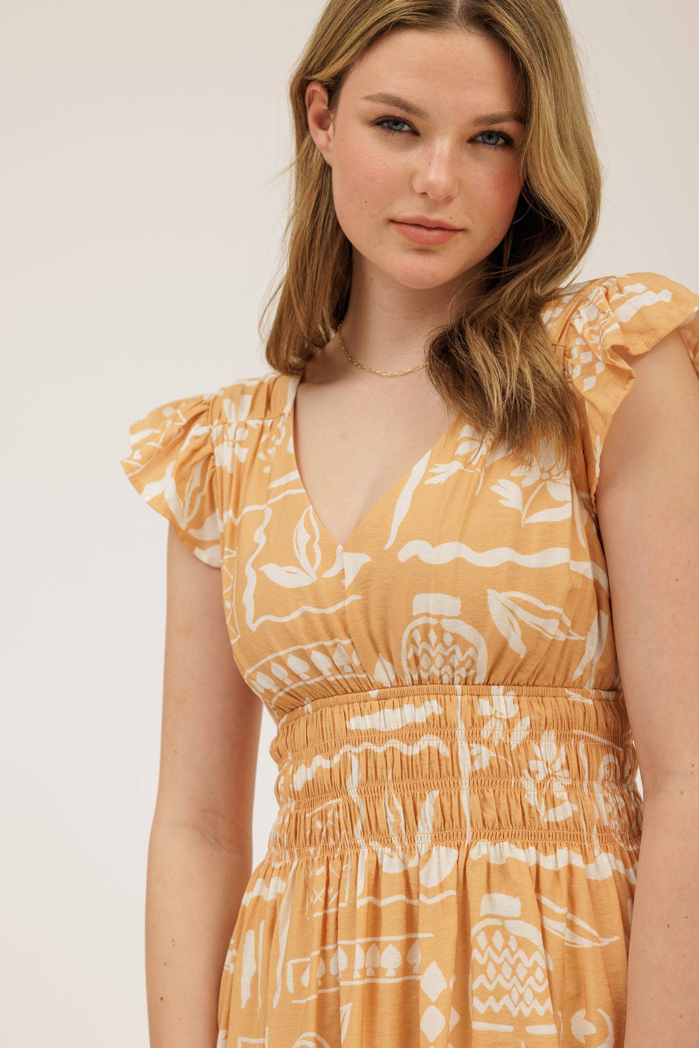 Blu Pepper Print V Neck Ruffle Mini Dress