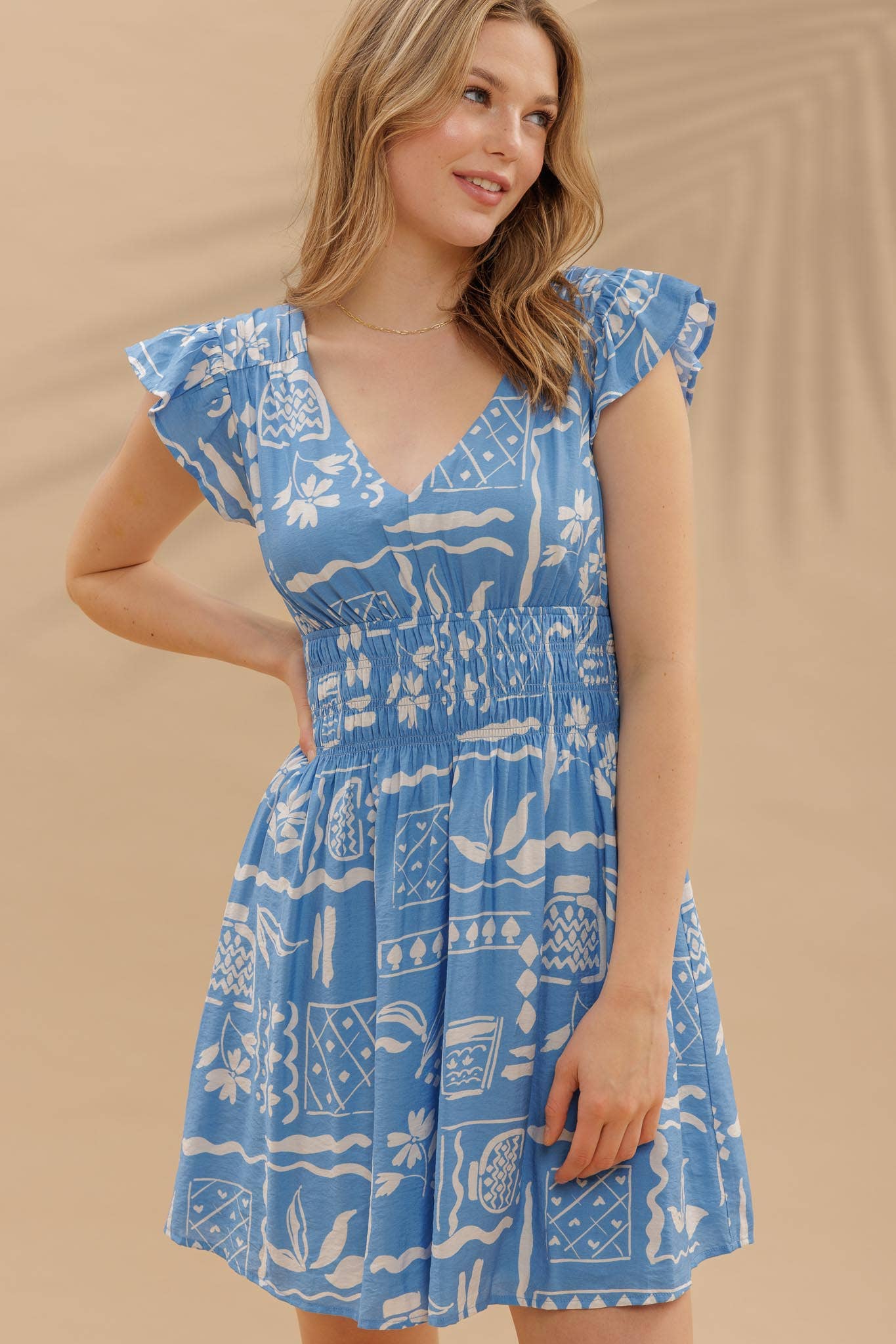 Blu Pepper Print V Neck Ruffle Mini Dress
